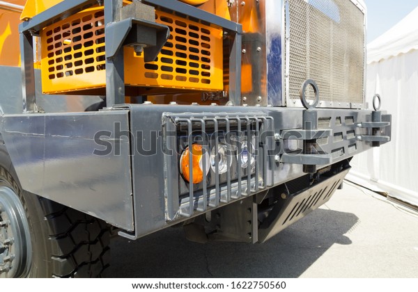 protected truck headlight\
with radiator