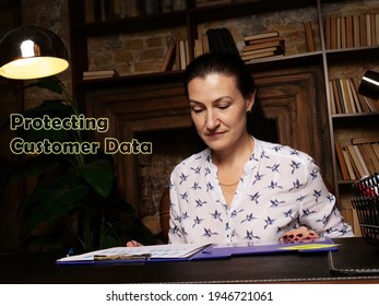  Protecting Customer Data Inscription. Closeup Portrait Of Unrecognizable Successful Businesswoman Wearing Formal Suit Reading Documents
