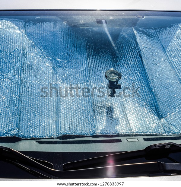 Protection of the car panel from direct\
sunlight. Sun Reflector\
windscreen.