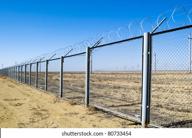 protection fence with barbed wire