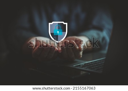 Protection network cyber security computer and safe your data concept, Businessman holding shield protect icon