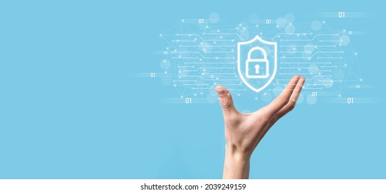 Protection network security computer and safe your data concept, Businessman holding shield protect icon. lock symbol, concept about security, cybersecurity and protection against dangers.