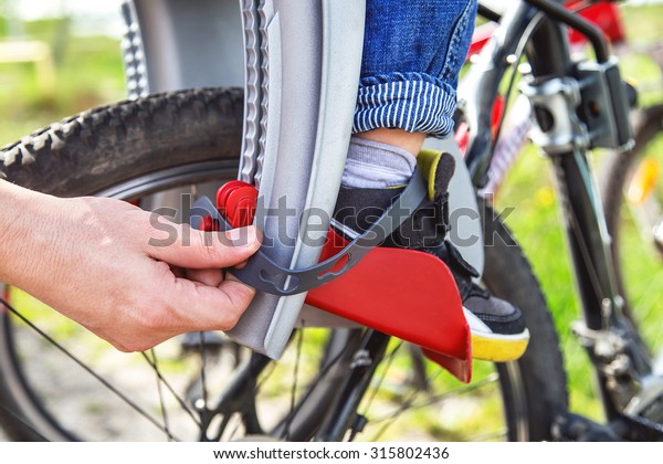 hands on bike seat