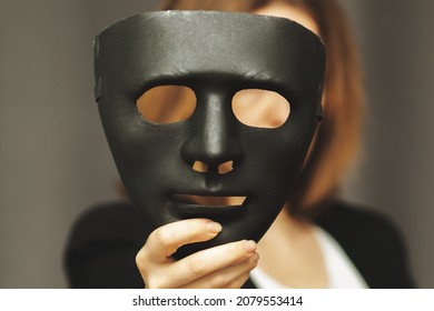 Protection Of Online Business, Personal Information,digital Payments, Woman With A Mask In Her Hand