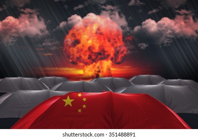 Protection Umbrella With Flag Of China On A War Background