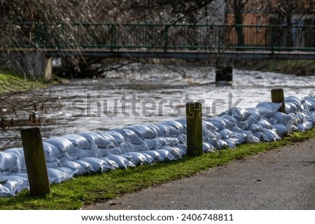 Protection with a wall of sandbags during floods on the river Helme
