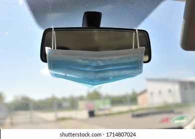 Protective Face Mask On Car Mirror Because Of Mask Obligation In Germany