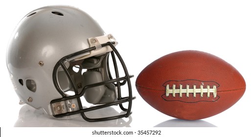 Protective Football Helmet And Leather Football With Reflection