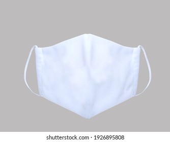 Protective Mask Covid-19, White Color For Mockup . Industrial Fabric. Isolated On Grey Background