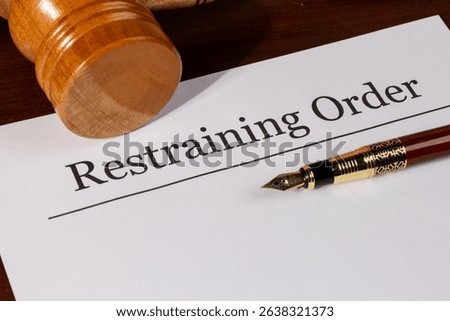 Protective Order Document on Judge’s Table with Gavel – Law and Safety Representation