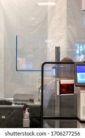 Protective Plastic And Plexiglass Screen Shields Installed At The Tills In Supermarket To Stop Coronavirus Spread. Cash Desks With Protective Shields.