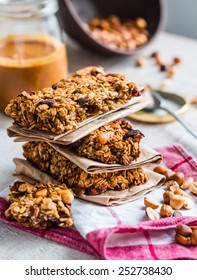 Protein Bars Granola With Seeds, Peanut Butter And Dried Fruit, Healthy Snack On Wooden Background