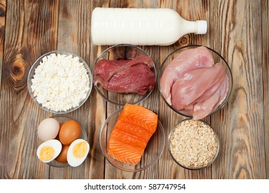 Protein Diet, Fish, Cheese, Eggs, Meat And Chicken Wooden Background