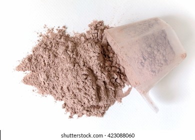 Protein Powder And Scoops On White Background