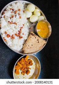 Protein Rich Meal . The Meal Contains Dal, Wholewheat Roti, White Rice, Peanuts, Boiled Eggs And Boiled Chicken Breast.They Are Rich In Protein, Fiber, Complex Carbs And Healthy Fats.