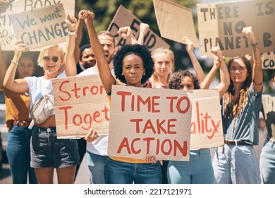 Protest, strike and climate change with a woman group fighting for our planet or human rights in the city. Environment, movement and pollution with female activist marching against global warming - Powered by Shutterstock