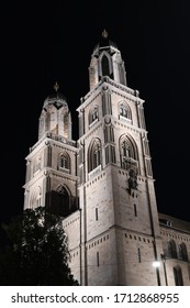 Grossmünster Protestant Church In Zürich, Switzerland At Night On The Black Sky. Limmat.