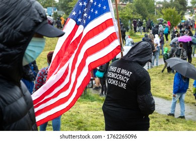 Protester With An American Flag And 