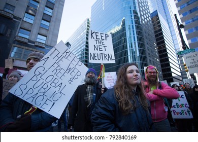Protestors advocating for net neutrality rally outside the headquarters of the Comcast Corporation in Philadelphia, Saturday, January 13, 2018.