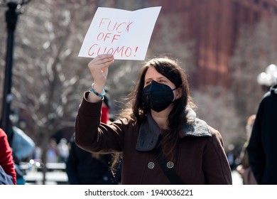 Protestors Call To Tax The Rich And Impeach Governor Andrew Cuomo Following Allegations Of Sexual Misconduct And A Covering-up COVID-19 Related Nursing Home Deaths On March 20, 2021 In New York City. 