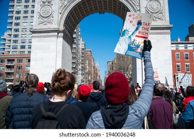 Protestors Call To Tax The Rich And Impeach Governor Andrew Cuomo Following Allegations Of Sexual Misconduct And A Covering-up COVID-19 Related Nursing Home Deaths On March 20, 2021 In New York City. 