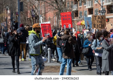 Protestors Call To Tax The Rich And Impeach Governor Andrew Cuomo Following Allegations Of Sexual Misconduct And A Covering-up COVID-19 Related Nursing Home Deaths On March 20, 2021 In New York City. 