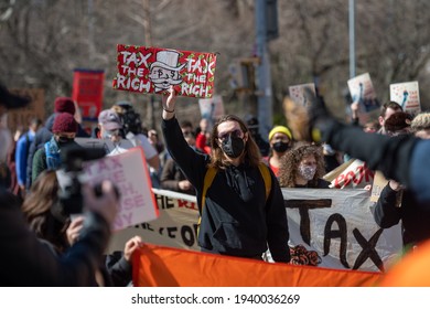 Protestors Call To Tax The Rich And Impeach Governor Andrew Cuomo Following Allegations Of Sexual Misconduct And A Covering-up COVID-19 Related Nursing Home Deaths On March 20, 2021 In New York City. 