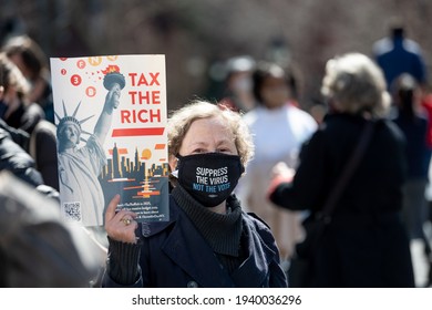 Protestors Call To Tax The Rich And Impeach Governor Andrew Cuomo Following Allegations Of Sexual Misconduct And A Covering-up COVID-19 Related Nursing Home Deaths On March 20, 2021 In New York City. 