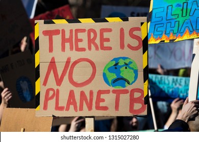 Protestors Holding Climate Change Banners At A Protest