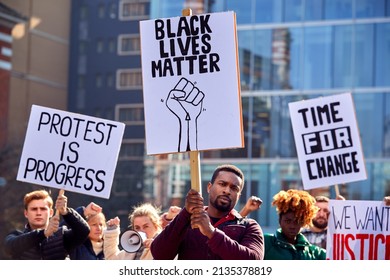 Protestors With Placards On Black Lives Matter Demonstration March Against Racism