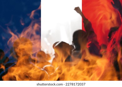 Protests France Paris. France flag. Protest in France. Rise hand. Pension reforms. Retirement age. Bastille day. Fireplace anarchy. Out of focus.