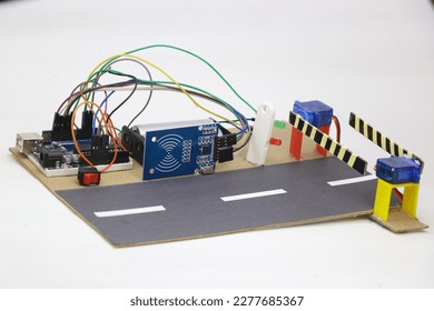 Prototype of automatic toll collection system using RFID sensor and servo. Working arduino projects made for mini engineering project