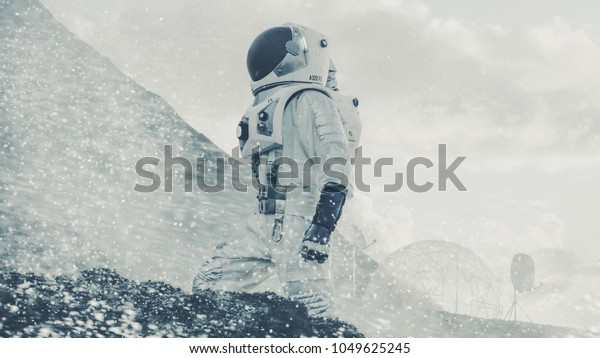 Proud Astronaut Confidently Explores Alien\
Planet\'s Surface During Snow Storm. People Overcoming Difficulties,\
Important Moment for the Human\
Race.