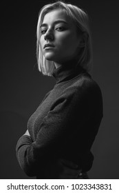 A Proud Female Is Posing In Studio. Black And White