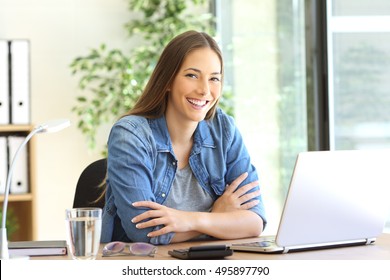 Proud Freelance Woman Posing At Office And Looking At You