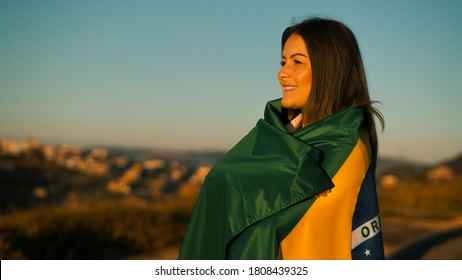 Proud girl of her country with flag of Brazil	 - Shutterstock ID 1808439325