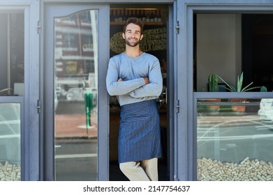 Proud Shop Owner. Cropped Shot Of A Handsome Young Cafe Owner.