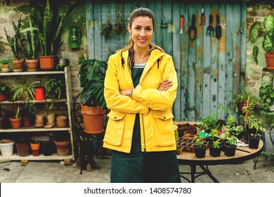 Proud Smiling Gardener In Her Home Garden