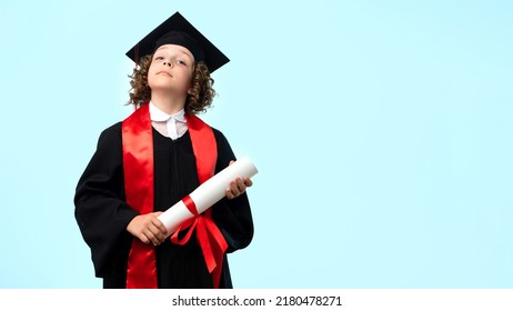 Proud whizz kid 10-12s female child girl wearing graduation cap and ceremony robe with certificate on light pastel blue studio background. Graduate celebrating graduation. Successful elementary school - Shutterstock ID 2180478271