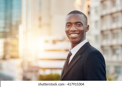 Proud Young African Business Entrepreneur Smiling In A City