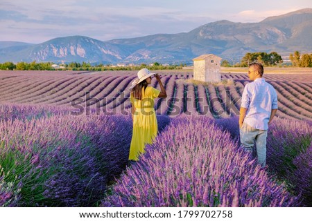 Provence, Lavender field France, Valensole Plateau, colorful field of Lavender Valensole Plateau, Provence, Southern France. Lavender field. Europe. Couple men and woman on vacation at the provence Stok fotoğraf © 