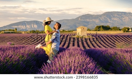 Provence Lavender Field France Valensole Plateau, a colorful field of Lavender at the Valensole Plateau Provence Southern France, a couple of men and women on summer vacation in France watching sunset Stok fotoğraf © 