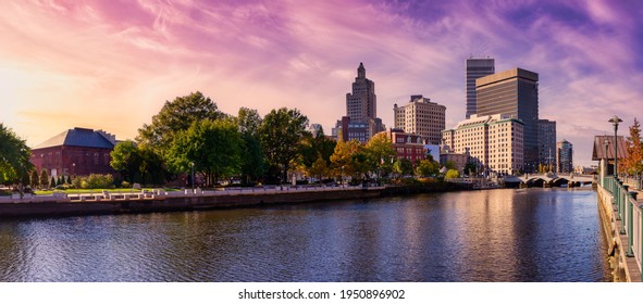 Providence, Rhode Island, United States. Panoramic view of a modern downtown city skyline on the Atlantic Ocean East Coast. Colorful Sunset Sky Art Render.