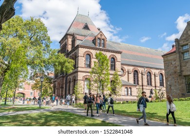 PROVIDENCE, RI/USA - SEPTEMBER 30, 2019:   Unidentfied individuals, and Sayles Hall  on the campus of Brown University.