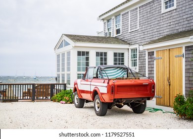 Provincetown, USA - September 2 2018: Red Pickup Truck Parked In Front Of A Beach House In Provincetown.