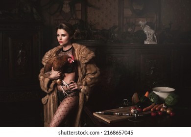 Provocative Image Of Gorgeous Woman Wearing Wearing Fur Coat Is Holding Hen. Animal Rights Concept.