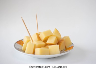 Provolone Cheese Cubes On A White Background