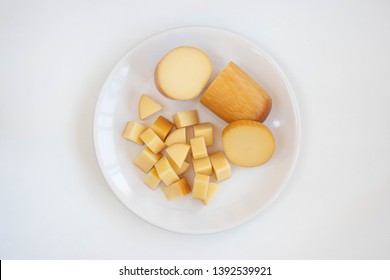 Provolone Cheese Plate On A White Background