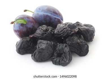 Prunes And Plums Isolated On White