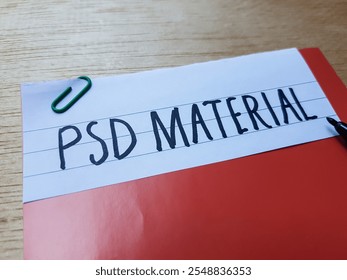 PSD material writting on table background.